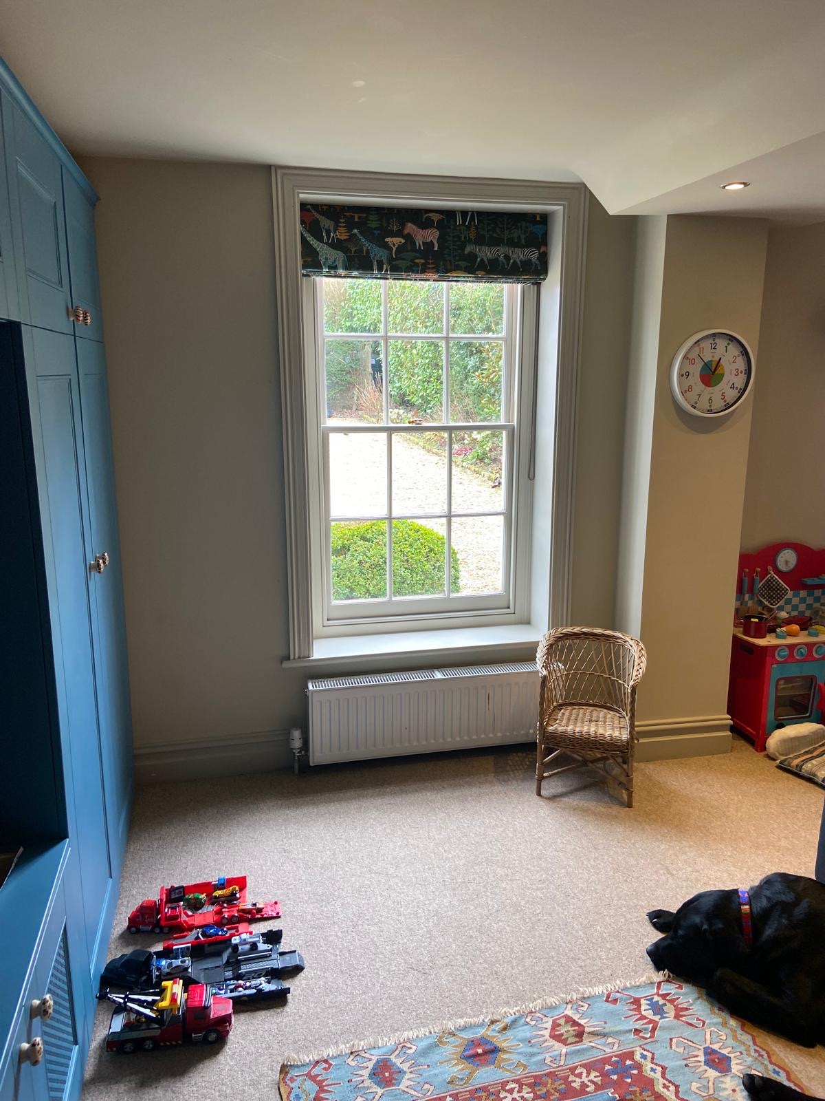 Safari animal print Roman blind in a child's playroom